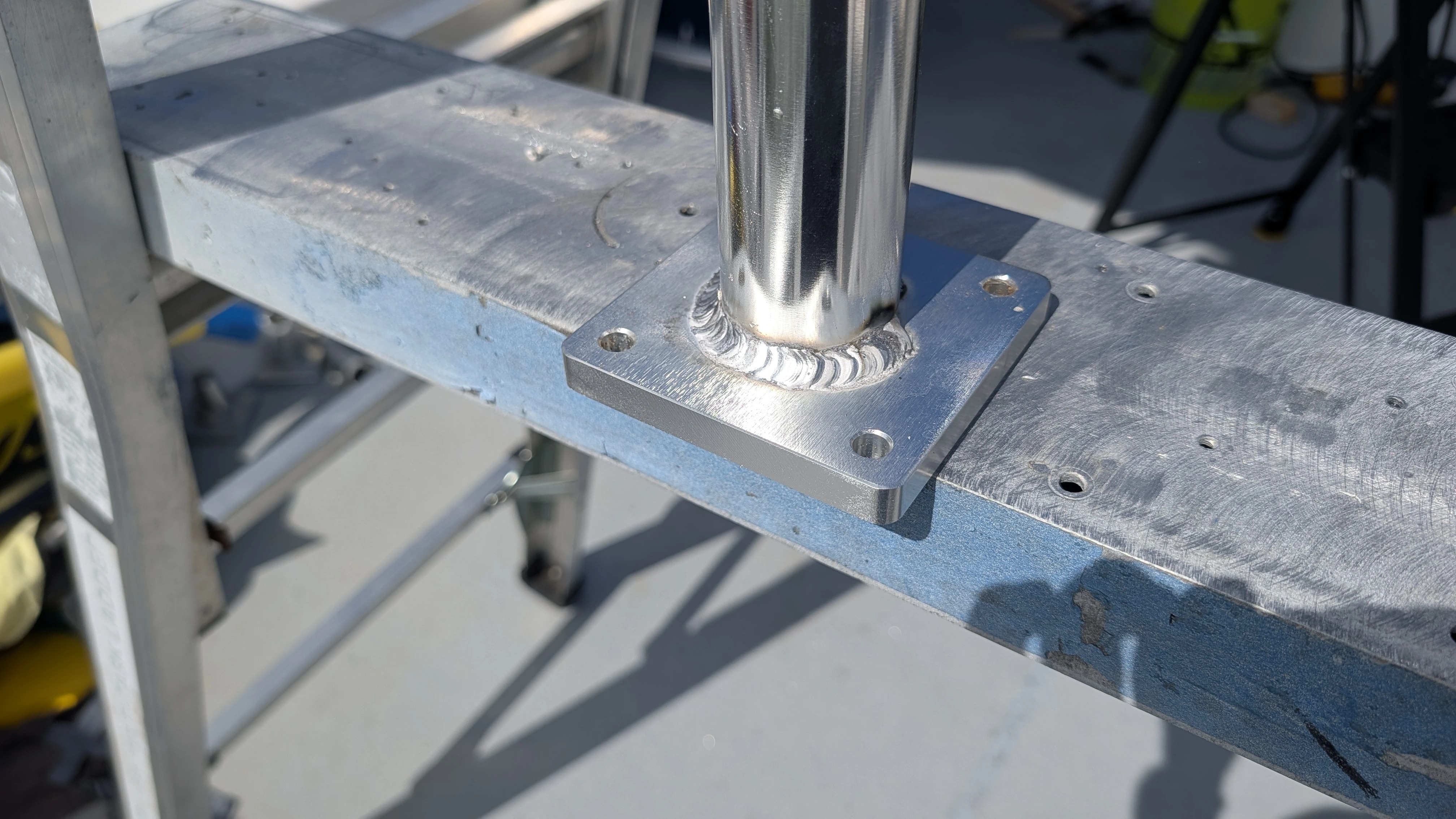 welding the pads on the uprights